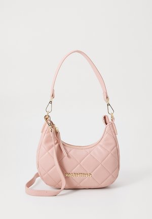 Pink quilted handbag made from faux leather, featuring a curved shape, gold hardware, and a detachable shoulder strap. Logo embossed on the front.