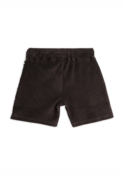 Svarta bomullsshorts med elastisk midja, en mjuk textur och en enkel design. Inga externa fickor eller utsmyckningar.