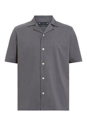 Lyhythihainen nappipaita harmaasta kankaasta, rento istuvuus, etunapit ja pieni brodeerattu logo vasemmassa rinnassa.