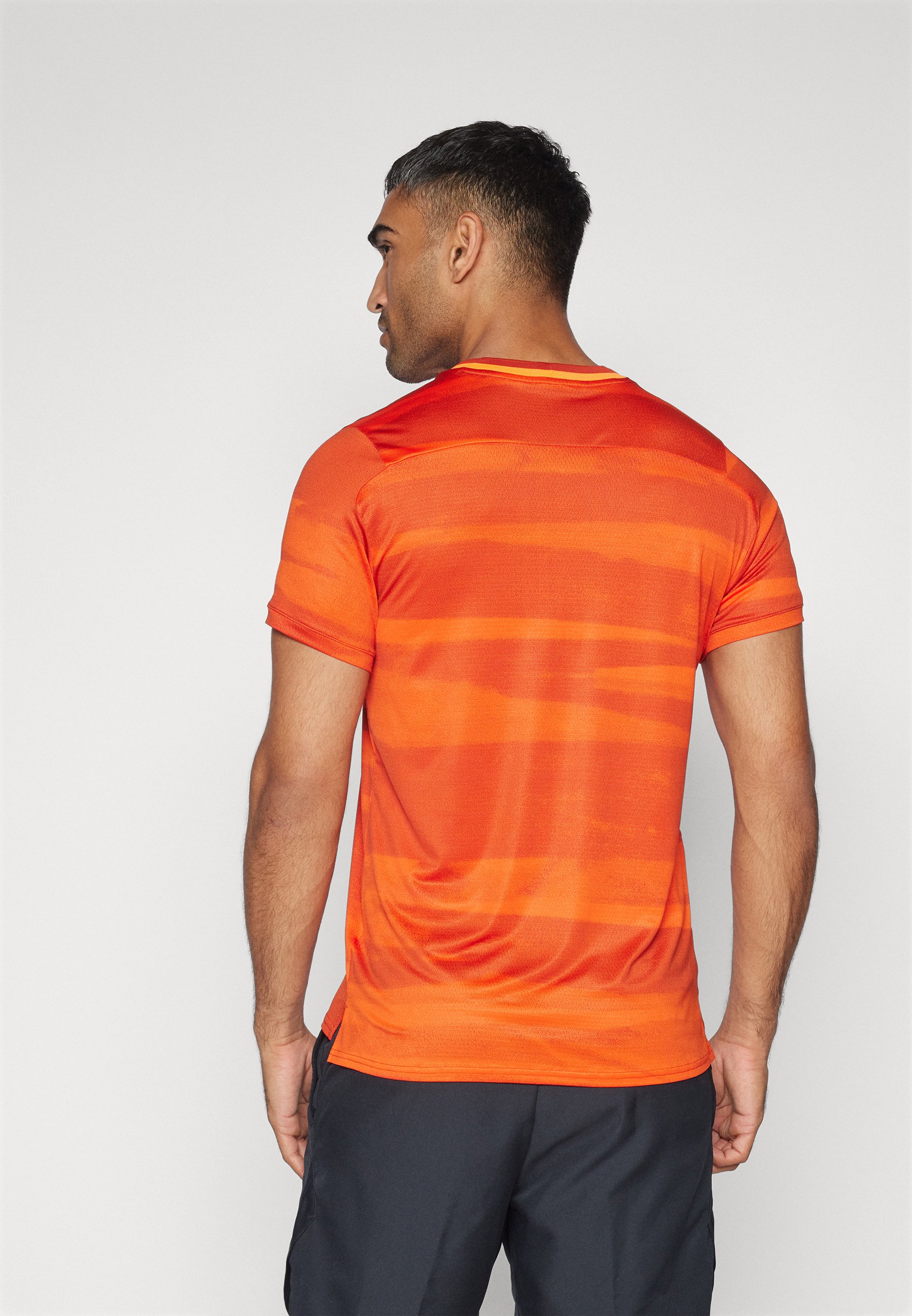 team orange nike shirt