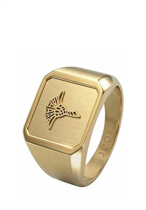 Gouden zegelring met een verhoogde gestileerde dierensilhouet op het vierkante vlak en het woord JOOP! gegraveerd aan de binnenkant van de band.