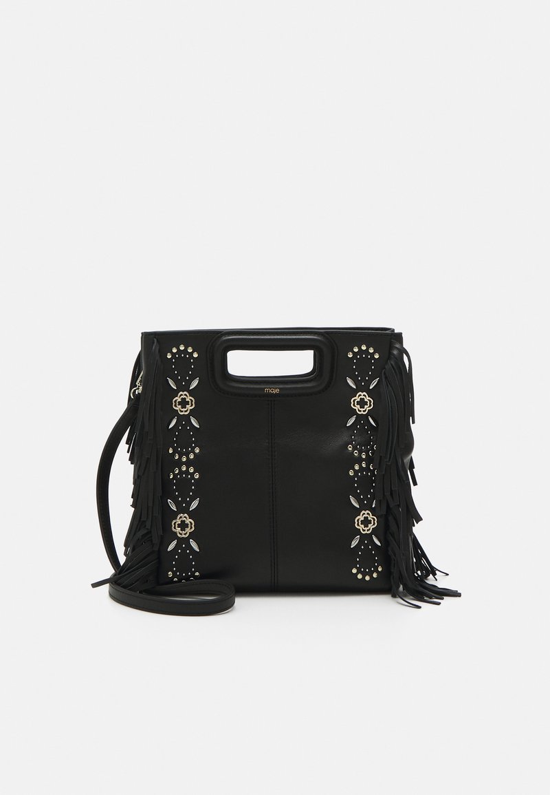 Black leather bag with fringe details on the sides, adorned with gold and silver studs in floral patterns. Rectangular shape with a top handle.