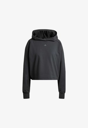 Sort cropped hoodie lavet af blødt stof med snor i hætten. Har lange ærmer og et diskret logo på brystet.