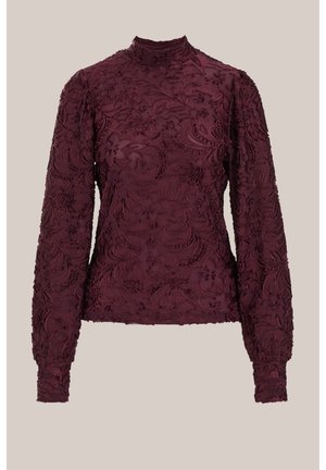 Bordeauxrode top met lange mouwen en een hoge halslijn, voorzien van ingewikkeld bloemenborduursel en een gestructureerde stof. Getailleerde pasvorm, elastische boorden.