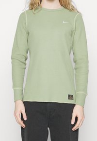 Nike Sportswear Stickad tröja - olive