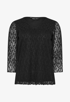 Mustapaita, jossa on 3/4-langan hihansuut ja V-pääntie. Kappaleessa on tukeva musta kangas, kun taas hihoissa on kukallinen pitsikuvio.