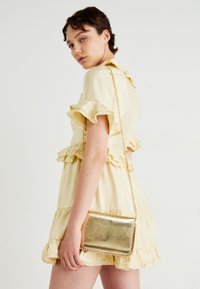 Clutch - gold-coloured