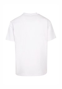 Hvid bomulds T-shirt med korte ærmer og rund hals. Bagsiden er enkel uden logoer eller designs og har en lige kant.