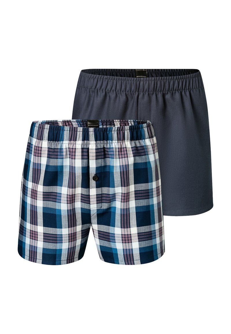 Two pairs of men's boxers. One is plaid in navy, white, and purple; the other is solid dark gray. Elastic waistband on both.