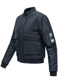 Navy jacket with a wool body and a smooth fabric sleeve. Features two front pockets and a zip pocket on the left arm. Ribbed cuffs.