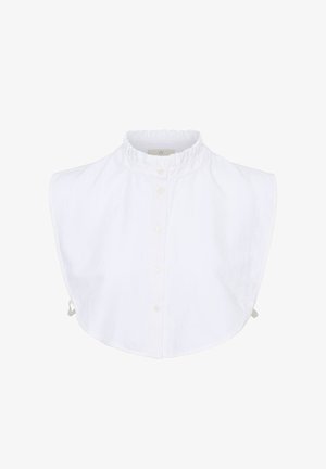 White cotton shirt with a ruffled collar, front buttons, and sleeveless design. Features adjustable ties on the sides for fit.