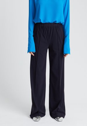 ADDISON - Trousers - midnight