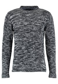 Maglione lavorato a maglia in nero e grigio con maniche lunghe, scollatura rotonda e un motivo testurizzato su tutta la superficie. Tessuto morbido con un design aderente.