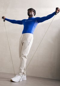 Champion ICONS HEM PANTS - Treniņtērpa apakšdaļas - silver lining