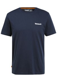 Mörkblå Timberland t-shirt med kort ärm och rund halsringning, med liten vit logotyp på vänster bröst och orange detaljer inuti halsringningen.