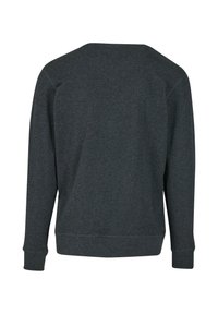 Felpa grigio scuro con maniche lunghe, vestibilità rilassata e scollatura arrotondata. Il tessuto sembra morbido con polsini e vita a costine.