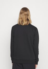 CLOSURE London Felpa - black