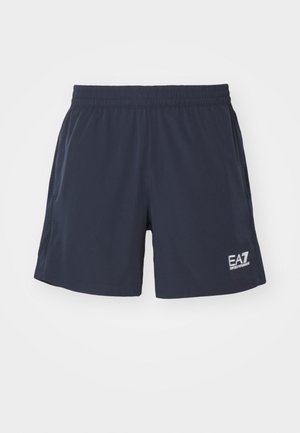 Marine zwemshorts met een elastische tailleband, voorzien van een klein wit logo aan de onderzijde rechts en een gladde, lichtgewicht stof.