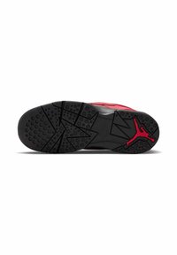 Scarpa sportiva rossa e nera con suola in gomma testurizzata, caratterizzata da un distintivo motivo di battistrada e un logo rosso prominente.