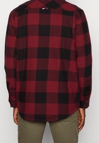 Tommy Jeans Overgangsjakke - bordeaux