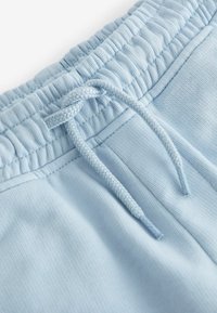 Next Träningsbyxor - mottled light blue