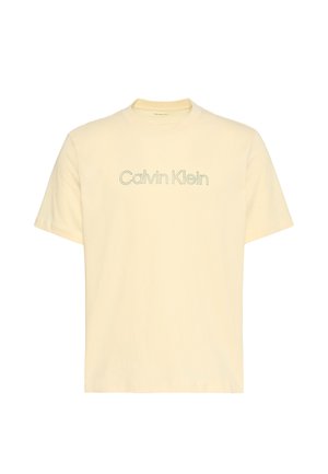 Roomkleurig T-shirt met korte mouwen met het "Calvin Klein"-logo in lichtgroene draad geborduurd over de borst.