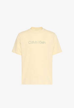 Roomkleurig T-shirt met korte mouwen met het "Calvin Klein"-logo in lichtgroene draad geborduurd over de borst.