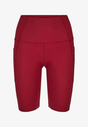 Hoch taillierte, dunkelrote Biker-Shorts mit Seitentaschen und sichtbaren Nähten, entworfen für sportliche oder legere Kleidung.