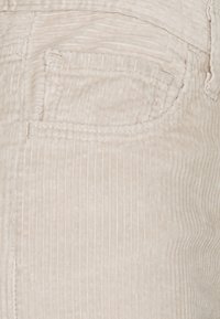 Levi's® RIBCAGE STRAIGHT ANKLE - Trousers - pebble cement