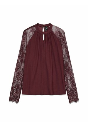Blusa borgogna con maniche lunghe in pizzo, scollatura a chiave e tessuto arricciato. Texture morbida con dettagli in pizzo floreale lungo le maniche.