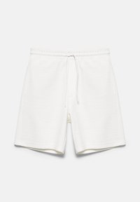 Shorts blancs décontractés avec taille élastique et cordon à l'avant, présentés sur un fond clair uni.