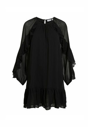 Abito nero con maniche arricciate e fondo arricciato, caratterizzato da un'apertura a chiave sul retro e realizzato in un tessuto leggero e trasparente.