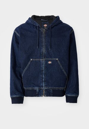 Denim zip-up hoodie in dark blue, features a drawstring hood, front pockets, and ribbed cuffs. Contrast stitching and brand label visible.