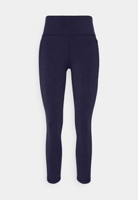 Marinblå tights med hög midja, gjorda av strukturerat, töjbart material. Har en sidoficka för förvaring.