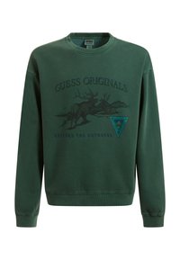 Groene crewneck sweatshirt met een voorste grafische afbeelding van een eland en bergen. Bevat de tekst "Guess Originals" en een driehoekig logo. Gemaakt van katoen.