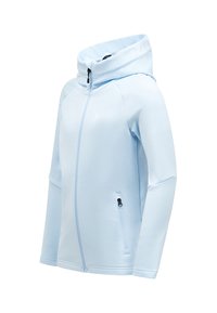 Giacca softshell blu chiaro con colletto alto, zip frontale e tasca laterale. Presenta un design senza cuciture e una minimalizzazione del brand sul colletto.