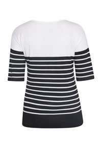 Pulover cu dungi, cu mâneci scurte. Prezintă dungi orizontale alb-negru, cu tiv și manșete negre din material ribbed. Material moale.