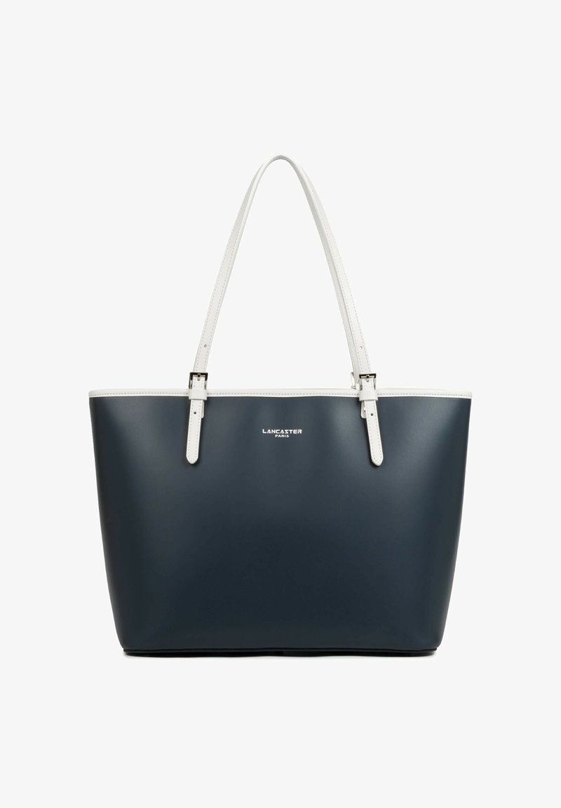 Sac fourre-tout bleu marine avec poignées et bordure blanches, équipé de boucles argentées et d'un petit logo "Lancaster Paris" centré à l'avant.