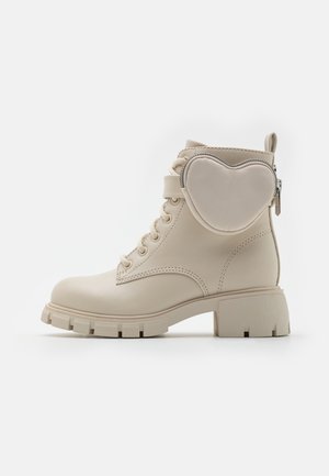 Botines con cordones - bone