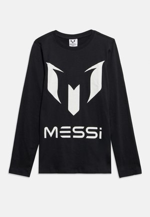 Musta pitkähihainen paita, jossa suuri valkoinen tyylitelty "M" -logo ja etupuolella painettu "MESSI"-teksti, pyöreä pääntie.