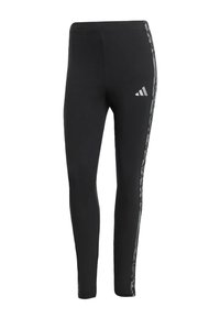 Black athletic leggings with grey camouflage side stripes and a small white Adidas logo on the upper thigh.