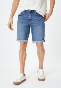 Koton Farkkushortsit - blue denim