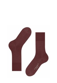 Chaussettes en coton bordeaux avec des bords côtelés et une texture lisse ; elles présentent un design sans couture et un logo imprimé sur la semelle.