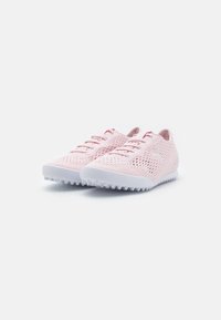 Pair of light pink breathable mesh sneakers with white rubber soles and Puma logo on sides, displayed on white background.