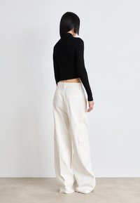 Tommy Jeans Striktrøje - black