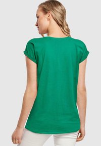 Merchcode BLOOM WIDELY EXTENDED - T-shirts med print - forest green