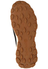 Semelle en caoutchouc avec un motif hexagonal brun, arborant la marque "Timberland" et un design sans marque pour une traction et une durabilité accrues.