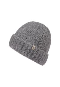 Gray knitted wool beanie with folded cuff and small rectangular fabric label on cuff, isolated on white background.