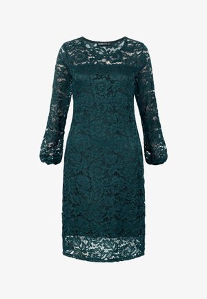 Vihreä pitsimekko, jossa on pitkät puffihihat, pyöreä pääntie ja kukkakuosiset yksityiskohdat. Puoliksi läpinäkyvä kangas, jossa on vartalonmyötäinen siluetti.