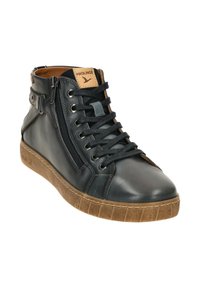 High-top sneaker in black leather with a textured brown rubber sole, featuring laces and a side zipper for easy access.
